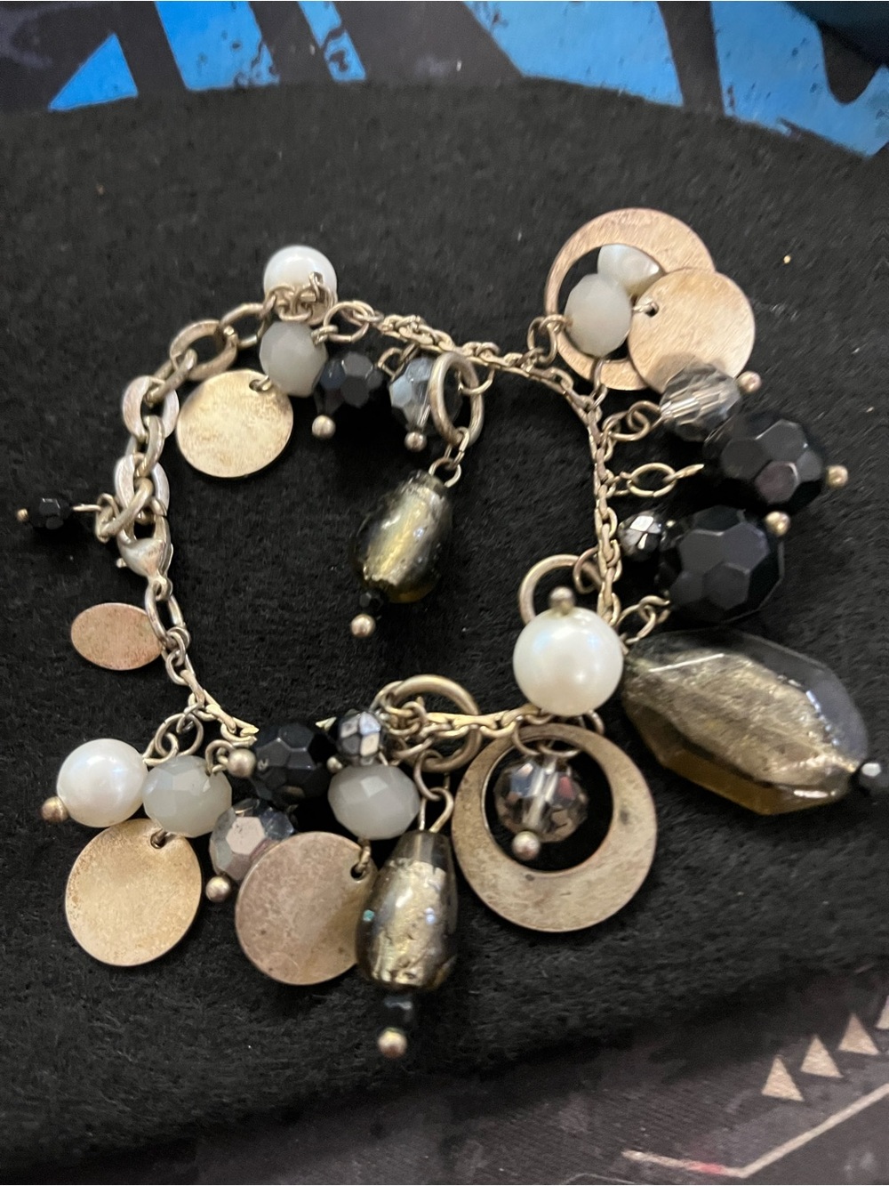 Multi-Charm Black, White and Gold Bracelet